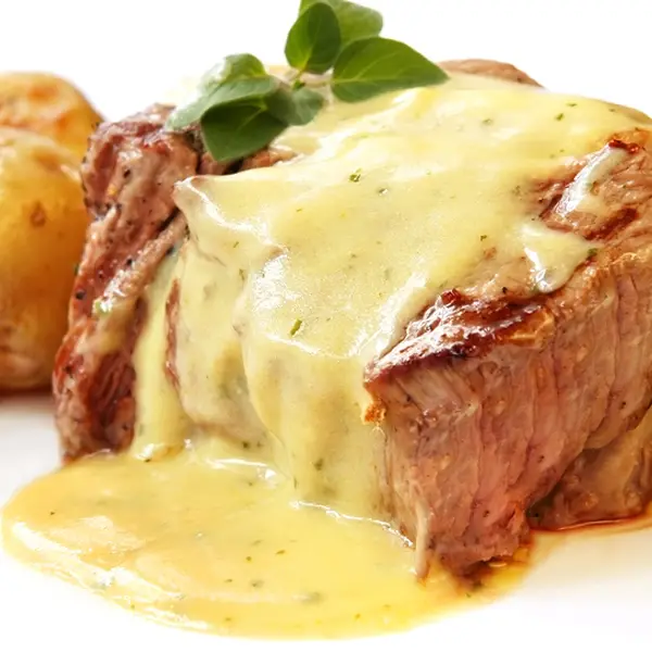 Grilled Filet Mignon Steak Topped With Melted Gorgonzola Cheese