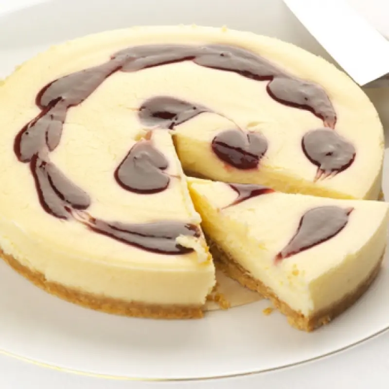 Orange Ricotta Cheesecake With Almond Nut Crust and Amaretto Drizzle