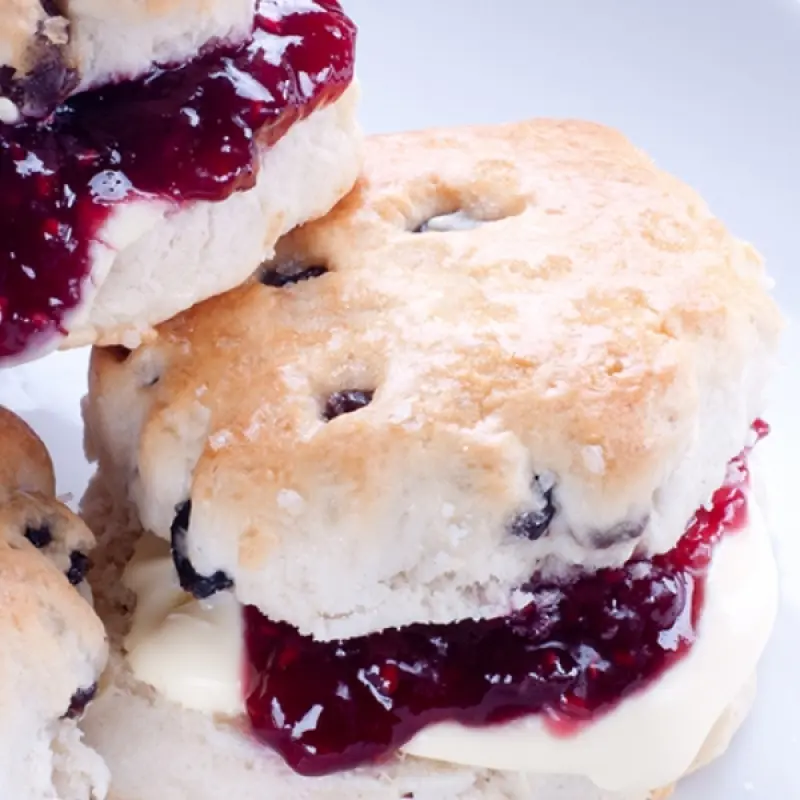 Raisin Scones With Cream And Jam