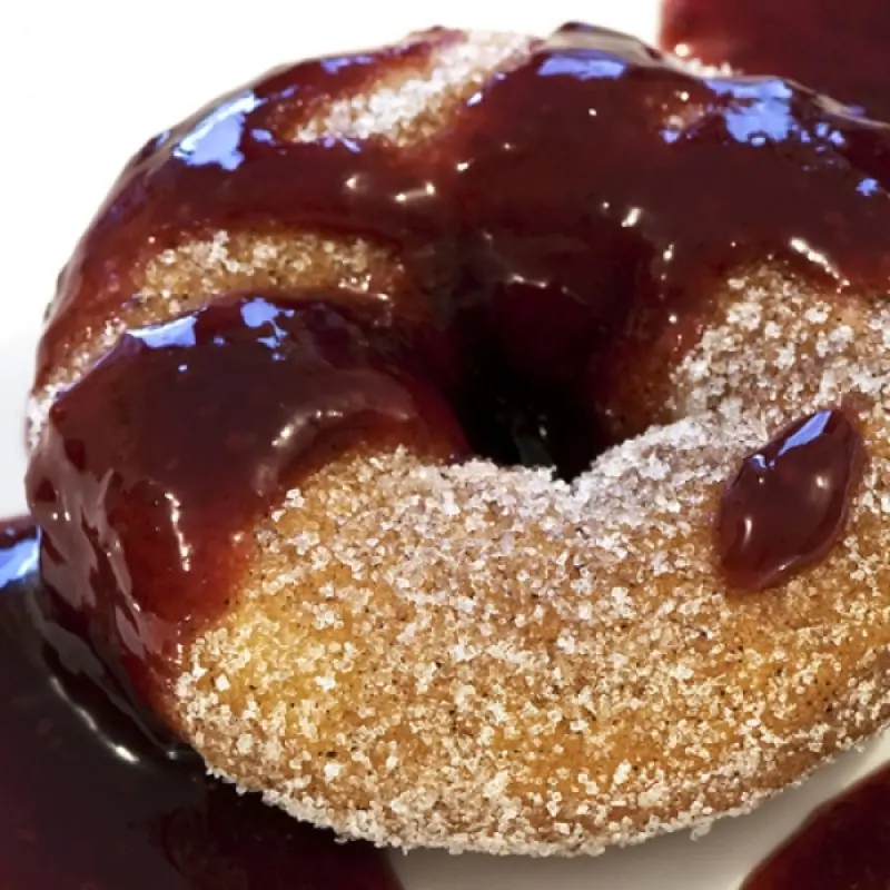 Baked Sugar Donuts Smothered In Chocolate Sauce