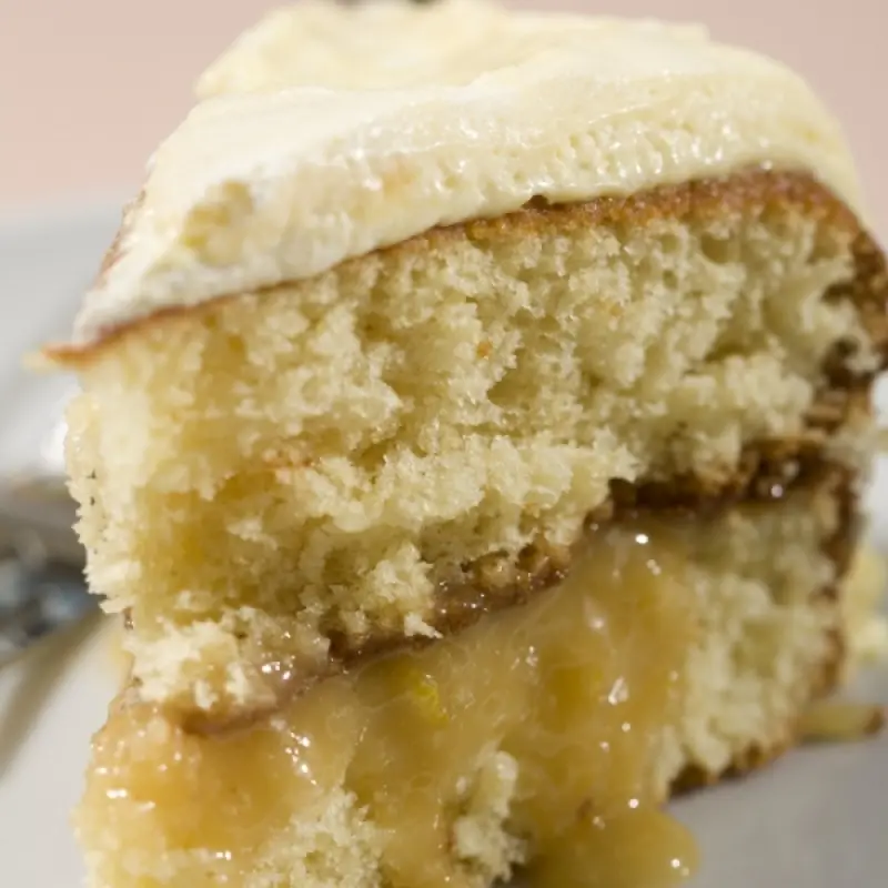Lemon Cake With Filling And Creamy Frosting