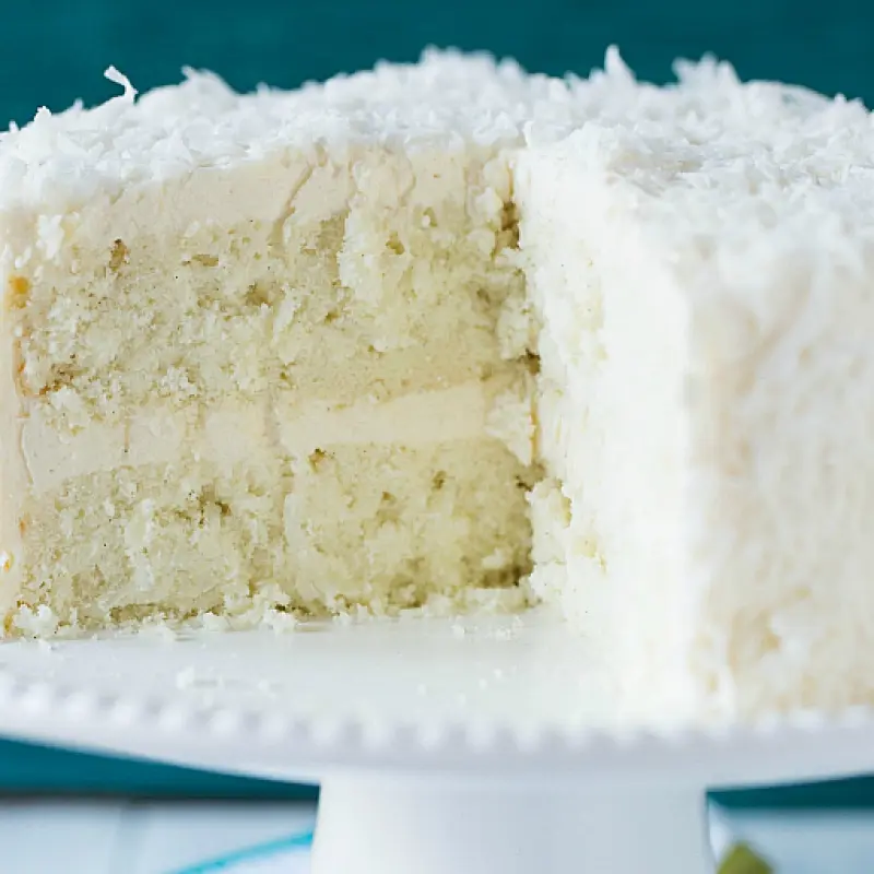 Coconut Vanilla Bean Cake with Coconut Meringue Buttercream Frosting