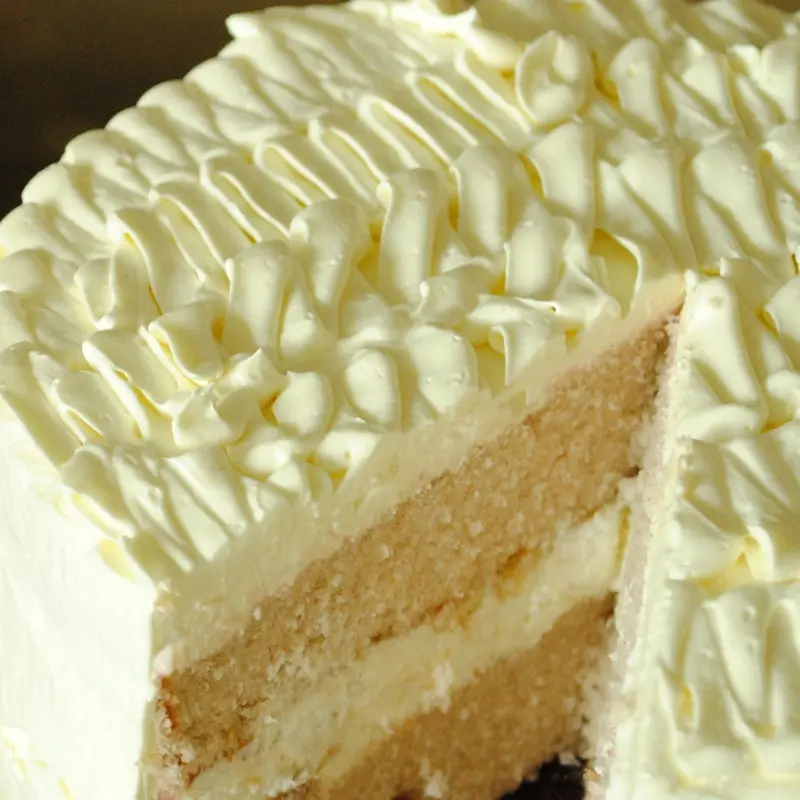 Banana Cream Cake With Ruffled Vanilla Frosting