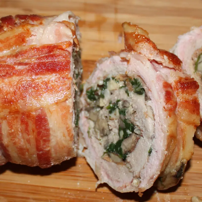 Bacon Wrapped Pork Tenderloin Roulade Stuffed with Spinach and Mushrooms