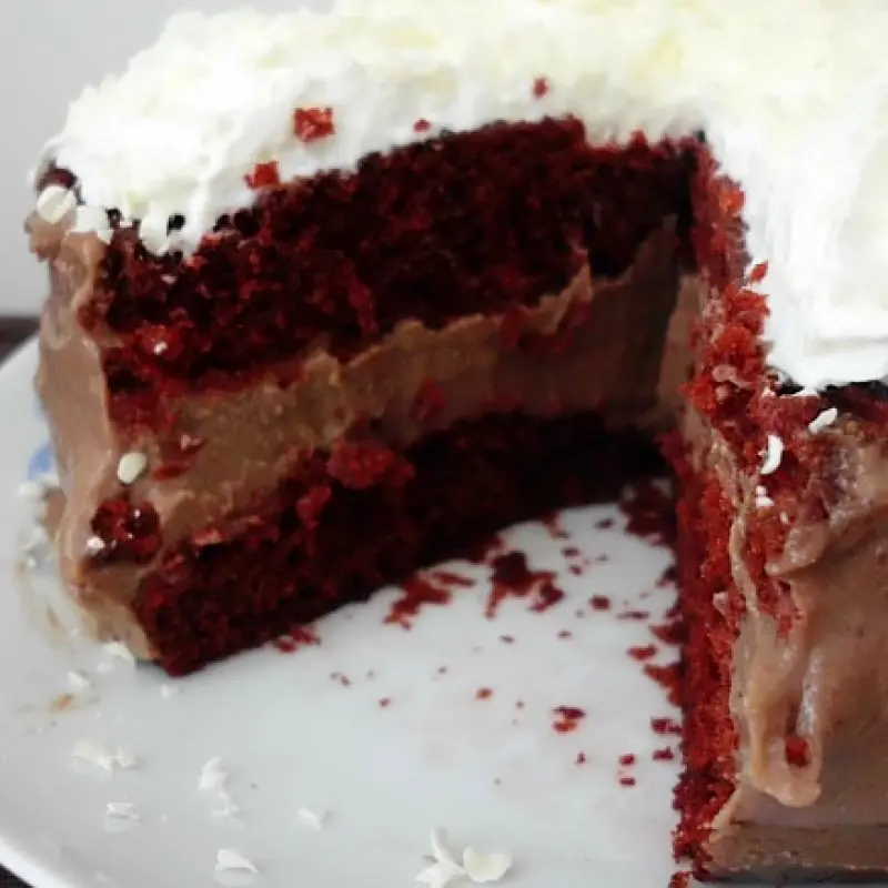 Chocolate Cheesecake Stuffed Red Velvet Cake with White Chocolate Whipped Cream Frosting
