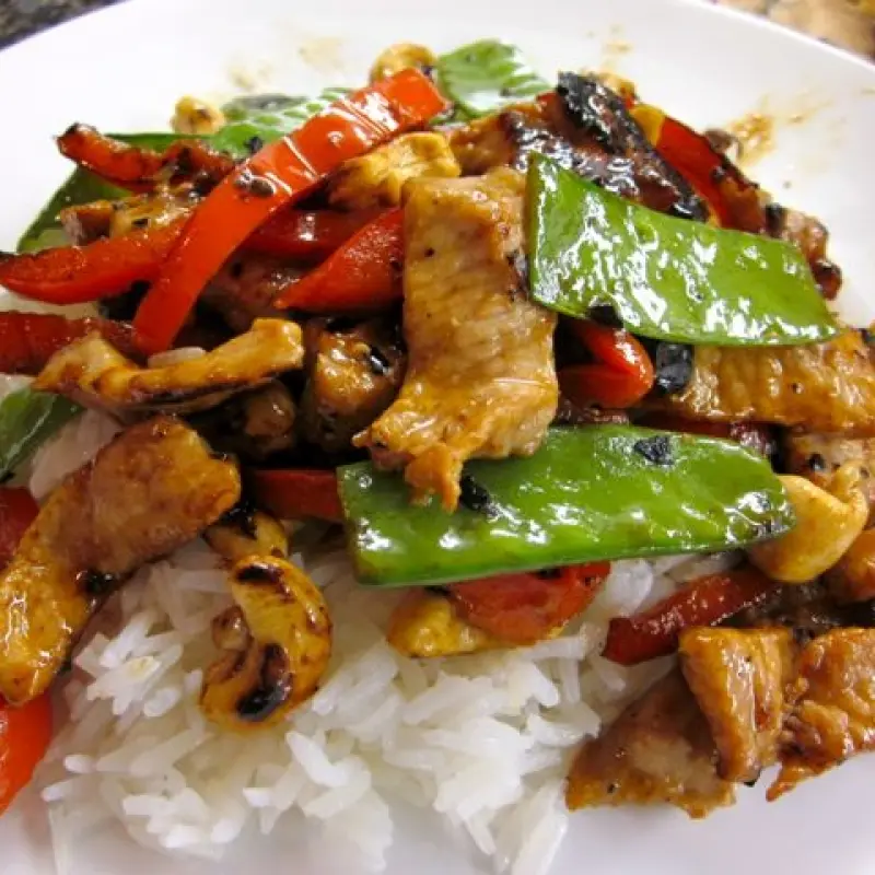 Spicy Pork and Cashew Stir-Fry with Snow Peas and Red Pepper