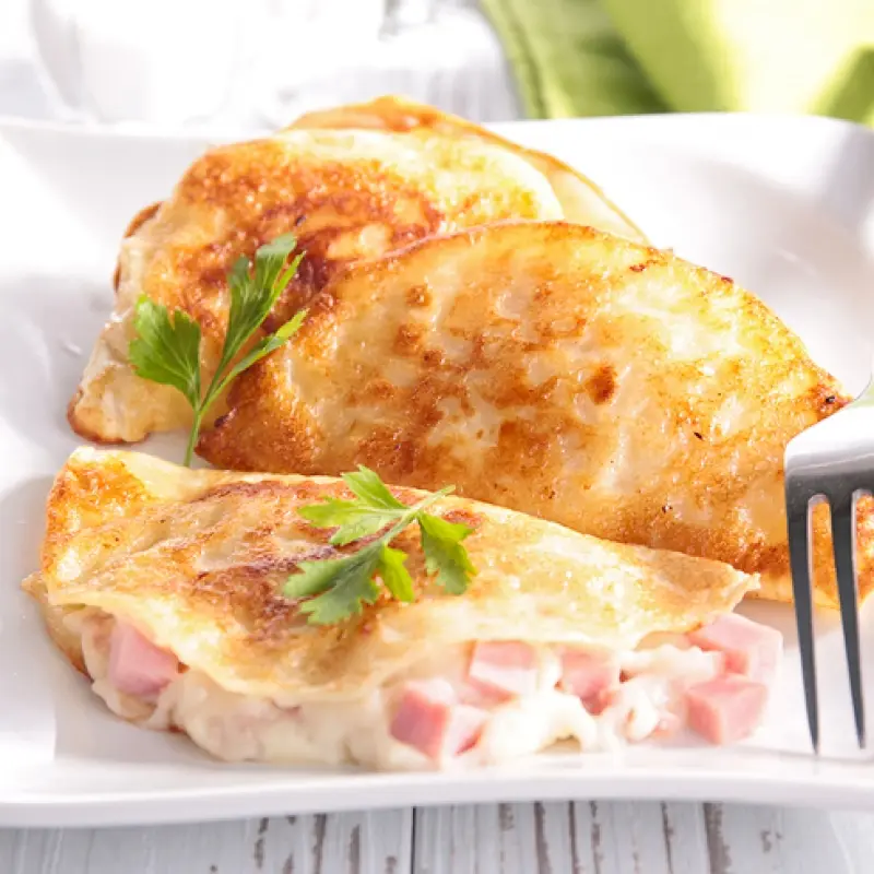 Crepes With Ham and Cheese Sauce